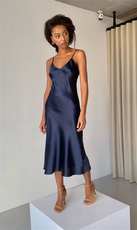 navy blue silk slip dress.